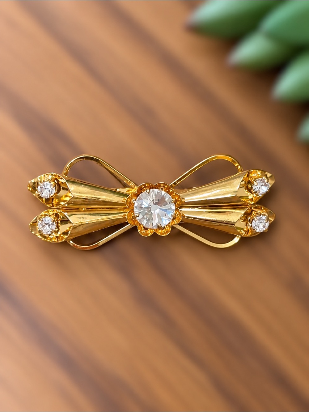Vintage Gold-Tone Bow Brooch with Clear Rhinestones